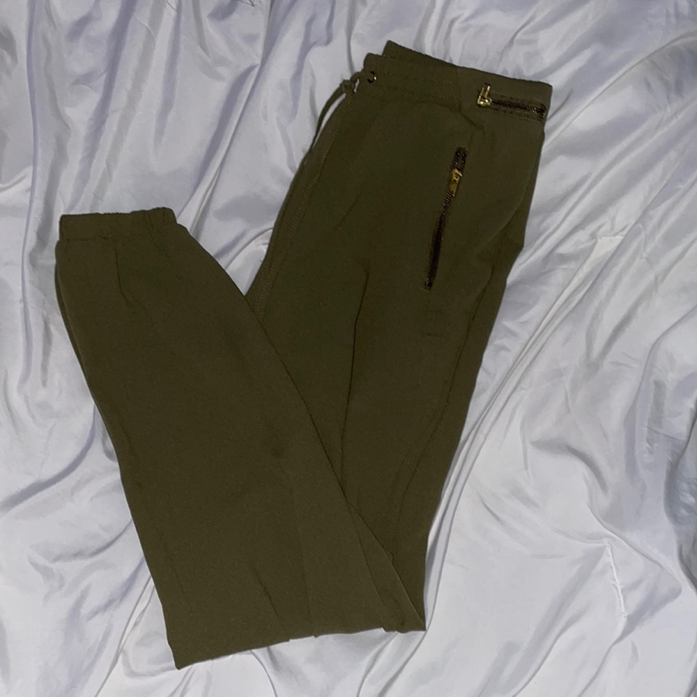 Dark green joggers.